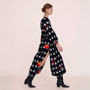 Gondi Black Kaftan side view showing the calf-length hem and side slit