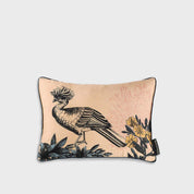 Decorative pillow with bird and floral design on a beige background