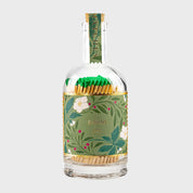 Foto de producto de Bottle Matches de Aura Collective: botella de vidrio con fósforos de punta verde, tapón de corcho con la palabra Matches en dorado, y etiqueta floral verde con el texto Winter Joy.