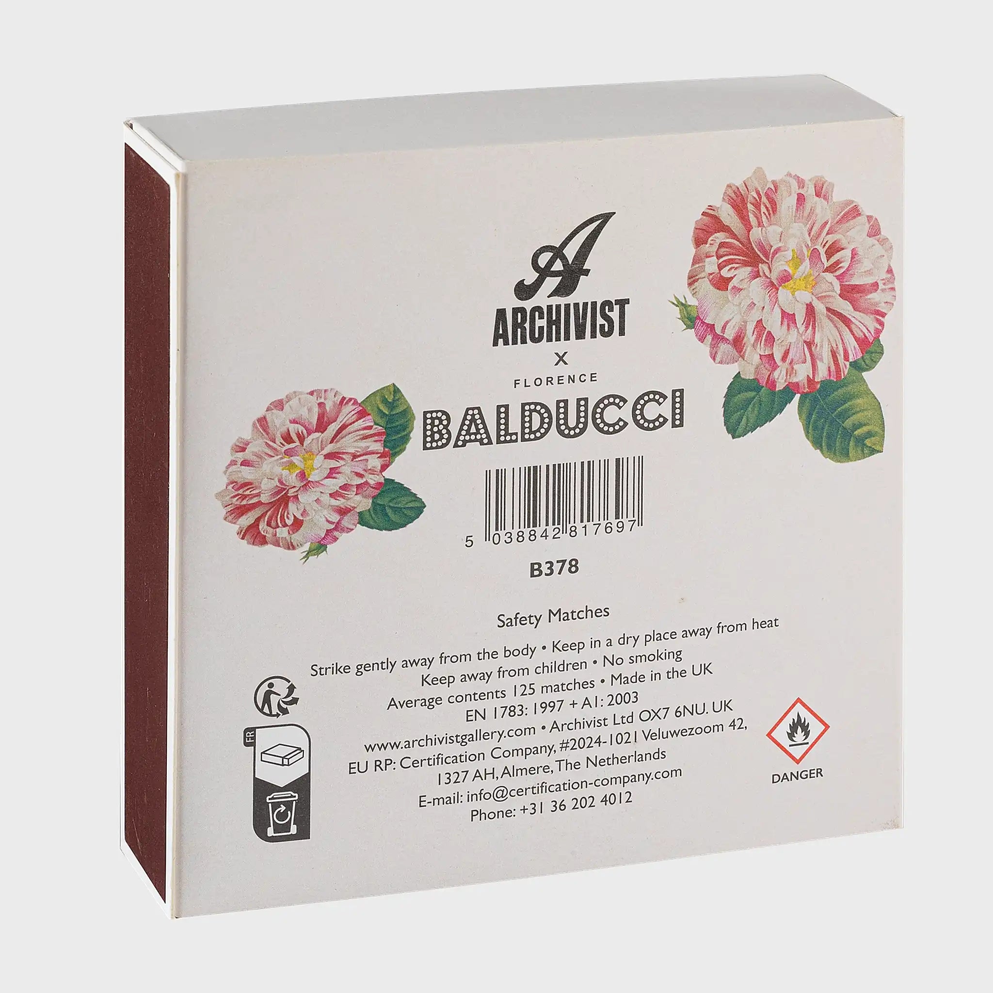 Parte trasera de la caja de fósforos Rose Provin Petunia de Aura Collective, con el logo de Archivist x Florence Balducci y las mismas rosas jaspeadas.