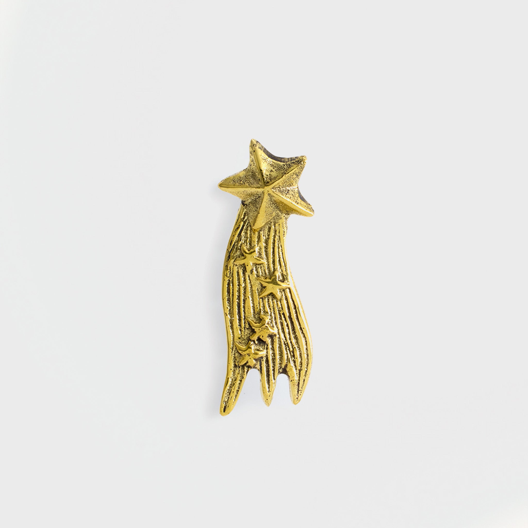 Supernova Star Candle Pin in recycled brass, front view