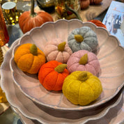 Aura Collective small wool pumpkins in an assortment of colors including amber, blush, gold, grey, orange, and pink